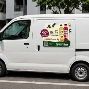 Custom shape magnetic sign printed on white delivery van in Singapore — flexible rubber magnet no residue