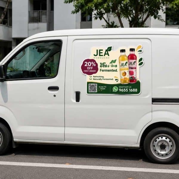 Custom shape magnetic sign printed on white delivery van in Singapore — flexible rubber magnet no residue